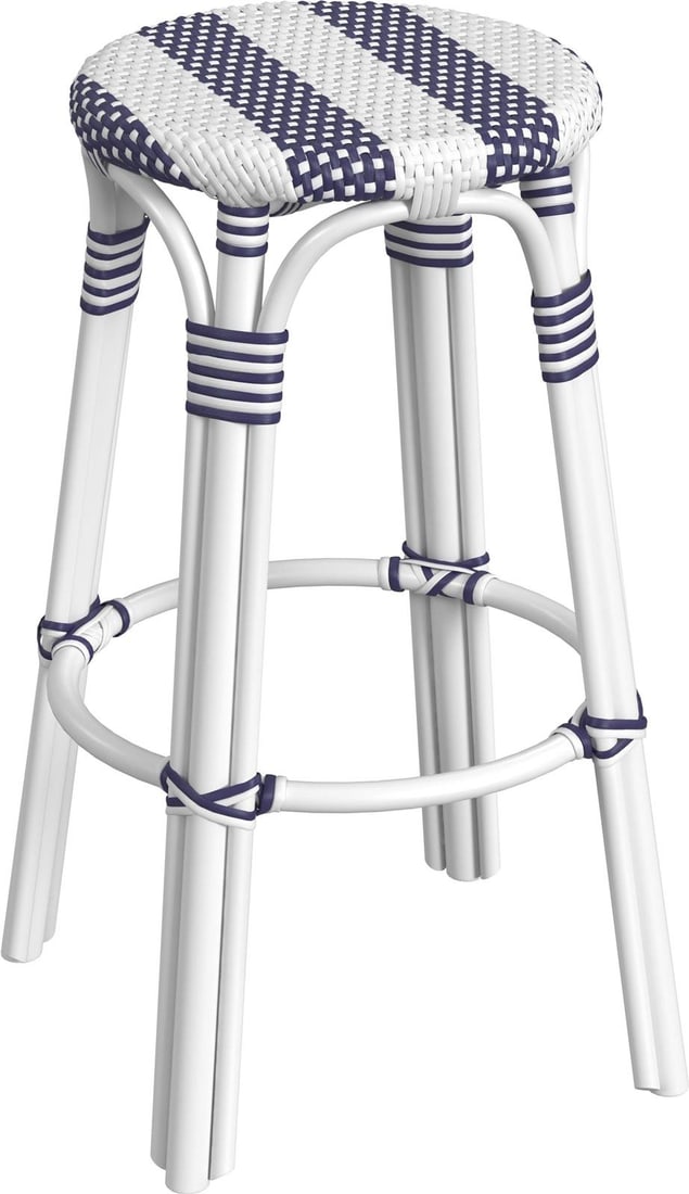 Butler Tobias Coastal Style Navy Rattan Bar Stool 30H: Butler Tobias Coastal Style Navy Rattan Bar Stool 30H Enhance your living space with the Stylish Butler Navy Rattan Bar Stool. This contemporary bar stool features a round shape and is designed in a c