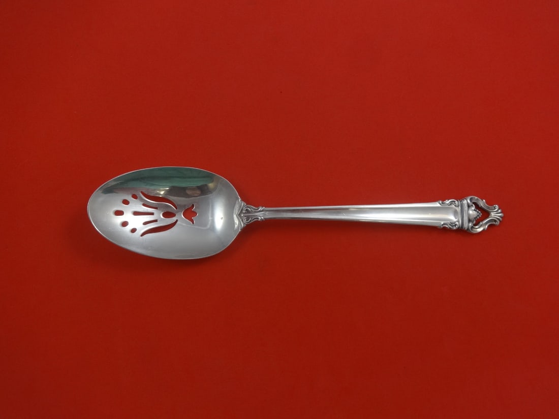 Reed and Barton Emperor Sterling Silver Slotted Serving Spoon 8 5/8": Reed and Barton Emperor Sterling Silver Slotted Serving Spoon 8 5/8" This elegant serving spoon features a beautiful pierced design and is crafted from high-quality sterling silver (.925). Made by Ree