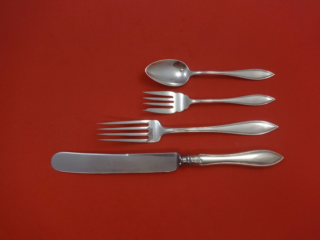 Norman by Birks Sterling Silver 4-Piece Dinner Place Setting: Norman by Birks Sterling Silver 4-Piece Dinner Place Setting Elevate your dining experience with this beautiful 4-piece dinner size place setting from the esteemed Norman by Birks collection. Crafted