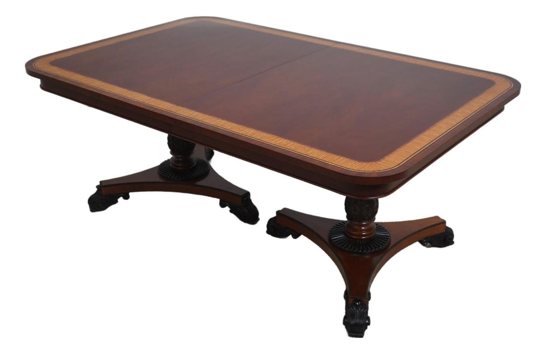 Baker Regency Mahogany Inlaid Dining Table with Leaves: Baker Regency Mahogany Inlaid Dining Table with Leaves This exquisite Baker Regency Style Dining Table showcases fine craftsmanship with its mahogany construction and intricate carved details. The tab