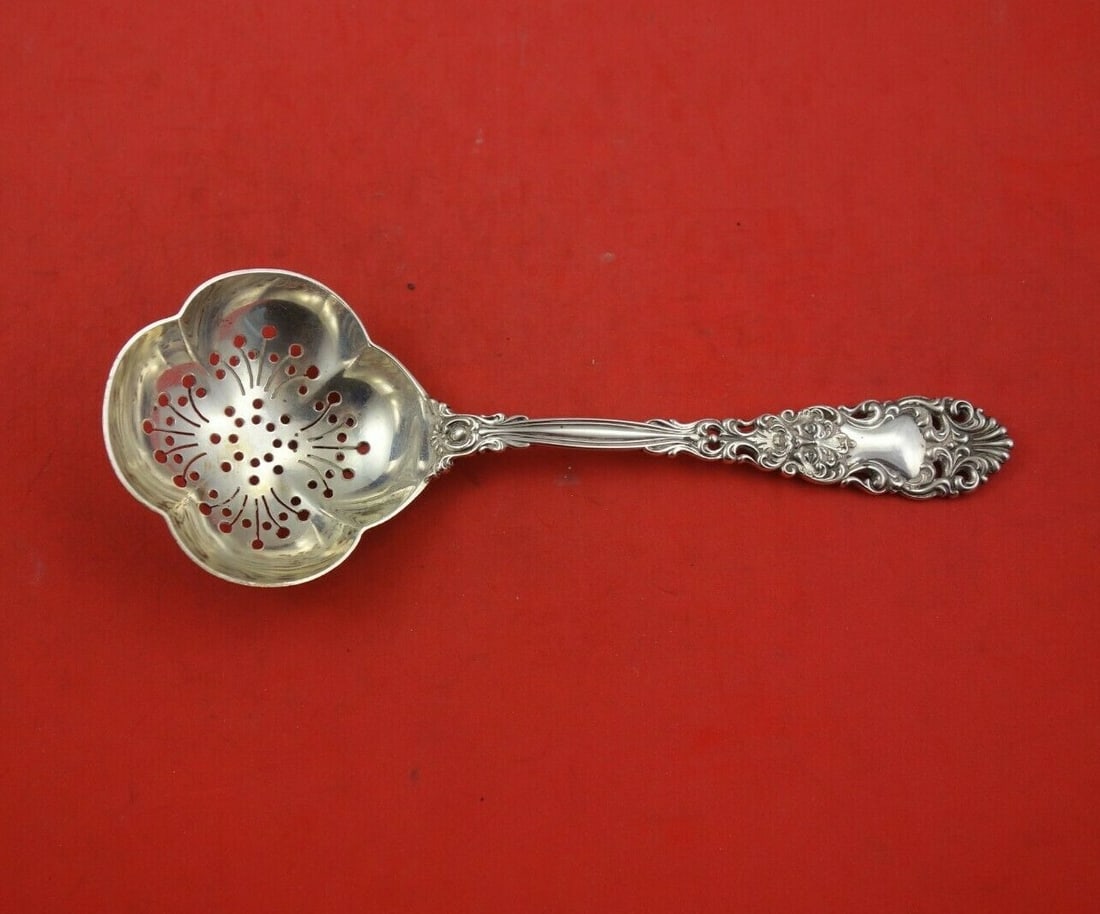 Dominick & Haff Renaissance Sterling Silver Sugar Sifter 7 1/8": Dominick & Haff Renaissance Sterling Silver Sugar Sifter 7 1/8" This elegant sugar sifter features a pierced handle and is crafted from high-quality sterling silver. Designed in the Renaissance patter