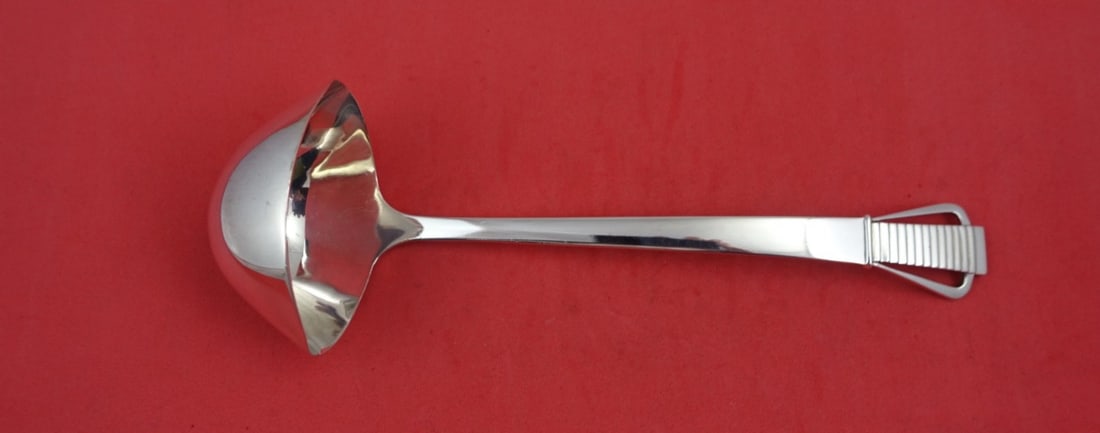 Georg Jensen Parallel Sterling Silver Gravy Ladle 8 Inches with Wings: Georg Jensen Parallel Sterling Silver Gravy Ladle 8 Inches with Wings This exquisite gravy ladle from the esteemed Georg Jensen features the elegant Parallel pattern, showcasing a unique design with w