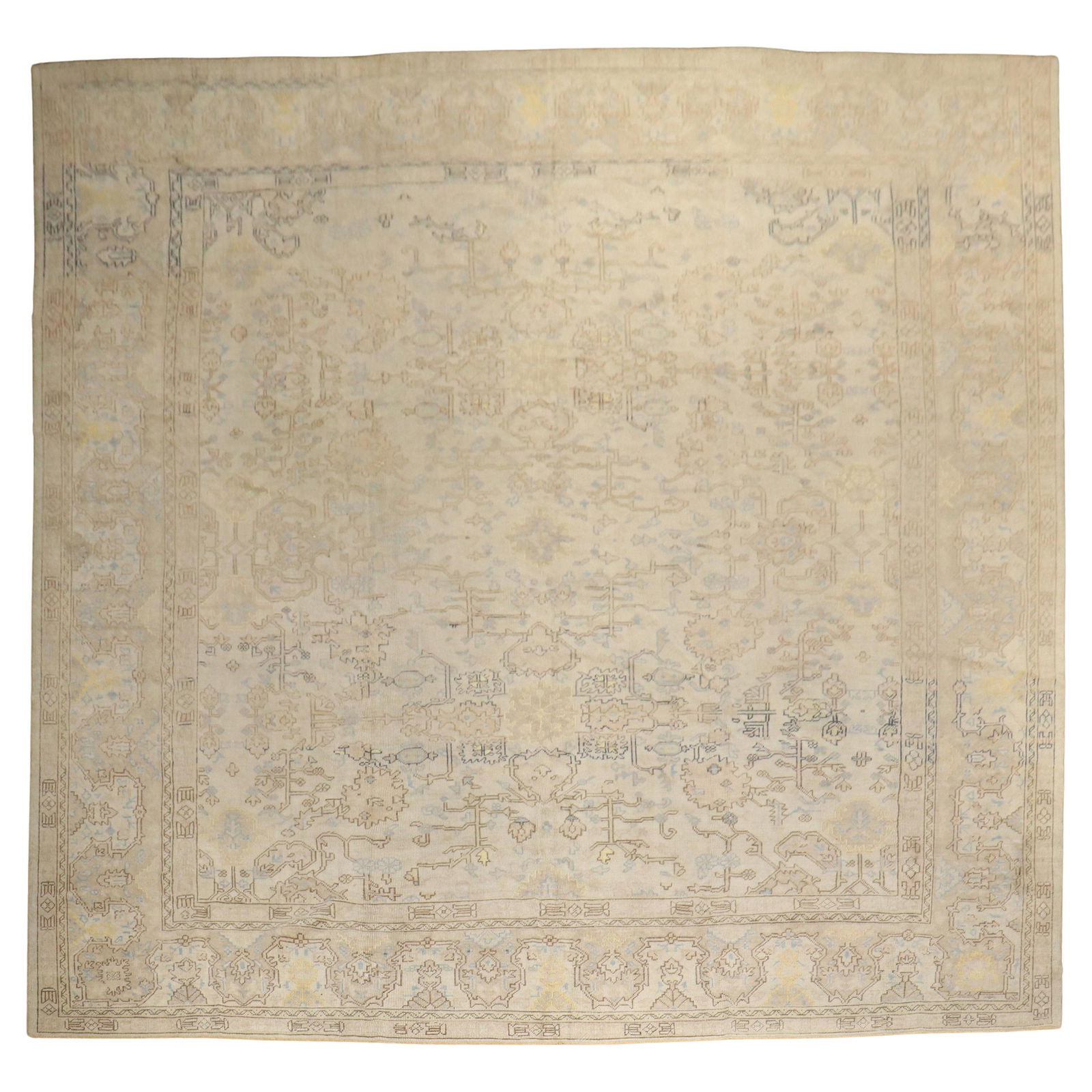 Early 20th Century Turkish Anatolian Hand-Knotted Square Wool Rug 11'9 x 13': Early 20th Century Turkish Anatolian Hand-Knotted Square Wool Rug 11'9 x 13' Discover the beauty of this early 20th-century Turkish Anatolian rug, boasting a neutral palette that complements any decor