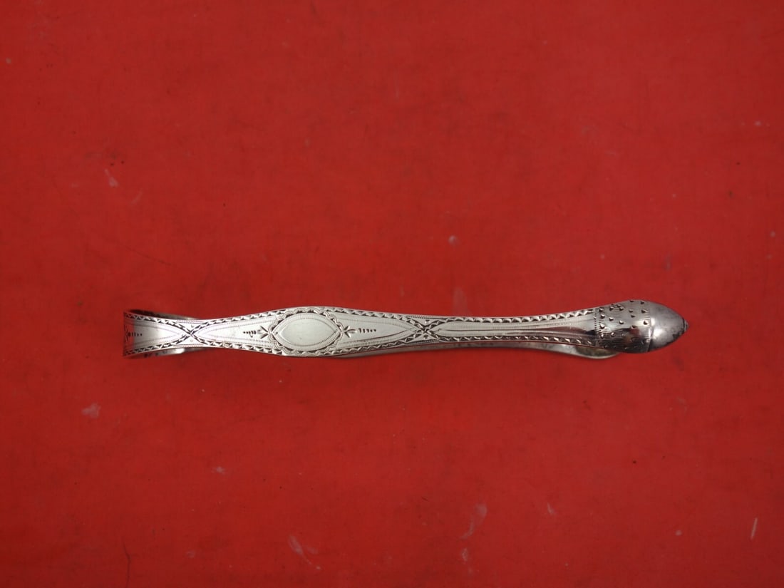 Georgian Sterling Silver Sugar Tongs by Bateman London 1796 Hand Engraved: Georgian Sterling Silver Sugar Tongs by Bateman London 1796 Hand Engraved This exquisite pair of sugar tongs is a fine example of English Georgian craftsmanship, crafted in sterling silver by the reno