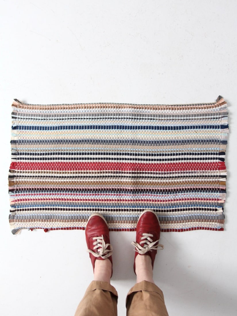 Charming Vintage Striped Accent Rug 32.5 x 19 in: Charming Vintage Striped Accent Rug 32.5 x 19 in Enhance your living space with this charming vintage striped accent rug. This small throw rug showcases a delightful striped pattern featuring muted to