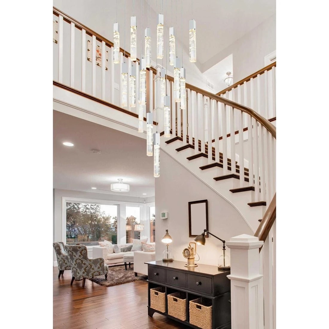 Aurora 30in Chrome Crystal Pendant Light 16 Bulbs: Aurora 30in Chrome Crystal Pendant Light 16 Bulbs Illuminate your space with this stunning modern pendant chandelier featuring 16 lights, designed for elegance and versatility. The chandelier boasts a