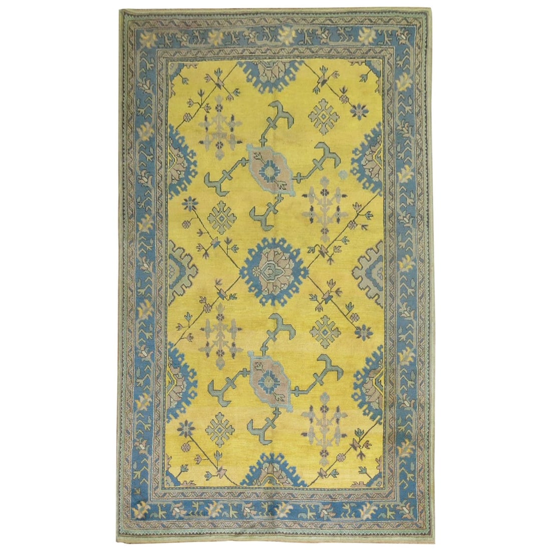 Vibrant Antique Turkish Oushak Rug Yellow Teal 6'1" x 9'9" Hand-Knotted: Vibrant Antique Turkish Oushak Rug Yellow Teal 6'1" x 9'9" Hand-Knotted This exquisite antique Turkish Oushak rug features a vibrant sunny yellow ground uniquely outlined by a striking teal border. Ha