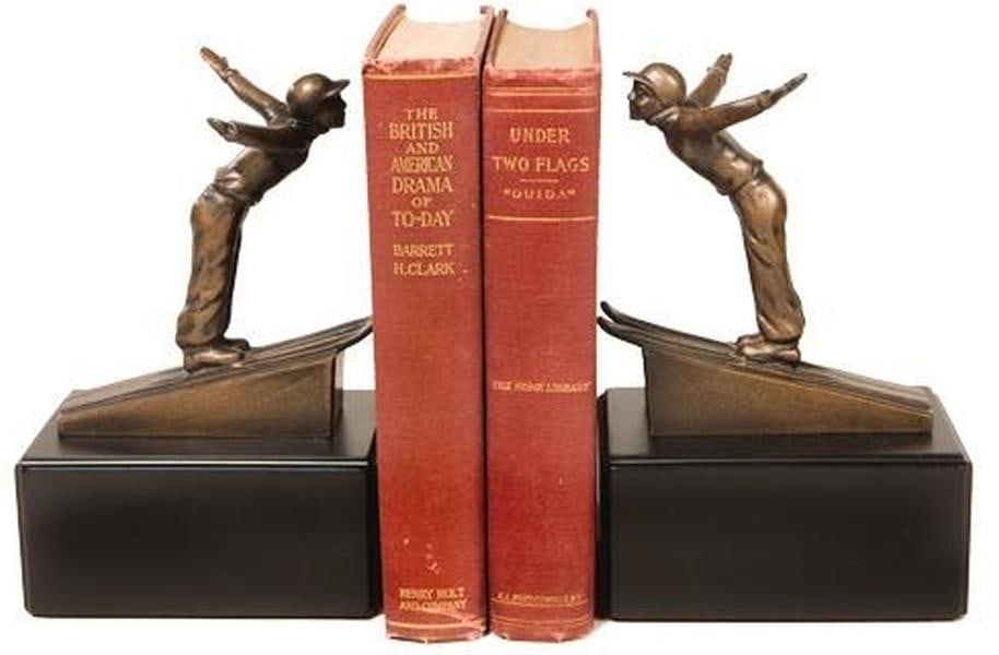 Lodge Style Hand-Cast Resin Ski Jumper Bookends 7 inches: Lodge Style Hand-Cast Resin Ski Jumper Bookends 7 inches Enhance your home decor with these charming Lodge Style Resin Ski Jumper Bookends. Perfect for winter enthusiasts, these hand-cast and hand-pai