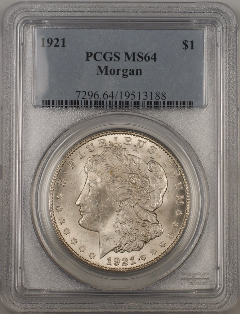 1921 Morgan Silver Dollar PCGS MS-64 Uncirculated Coin: 1921 Morgan Silver Dollar PCGS MS-64 Uncirculated Coin This 1921 Morgan Silver Dollar, certified by PCGS, features a remarkable grade of MS 64, indicating its uncirculated condition. Minted in Philade