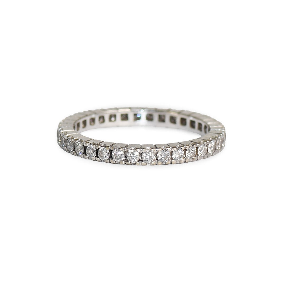 18K White Gold 0.55 ct Diamond Eternity Band Ring: 18K White Gold 0.55 ct Diamond Eternity Band Ring This exquisite 18K white gold diamond eternity band ring features a total of 0.55 carats of round brilliant cut diamonds. The diamonds exhibit a clari