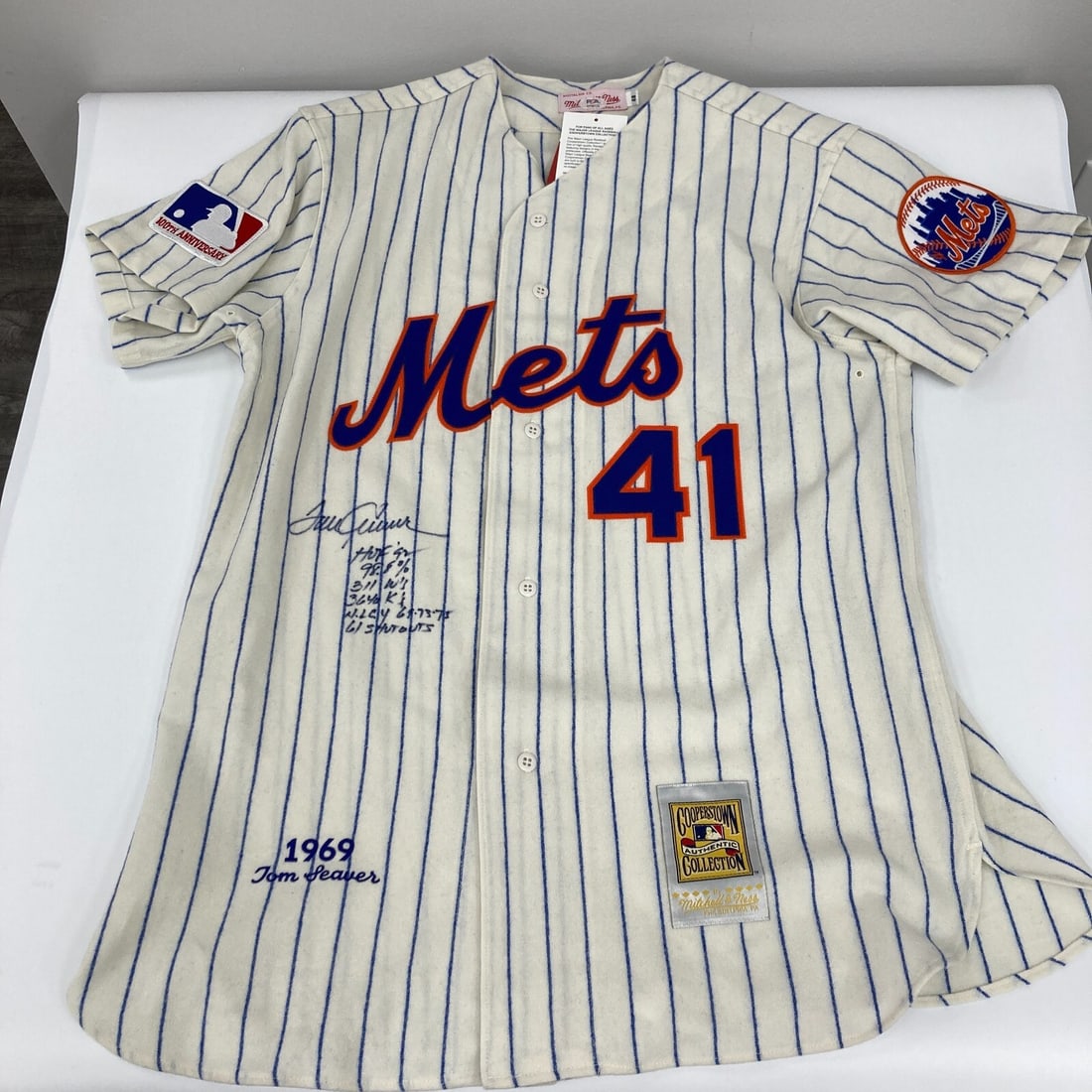 Tom Seaver Signed New York Mets Mitchell & Ness Jersey with Inscriptions PSA: Tom Seaver Signed New York Mets Mitchell & Ness Jersey with Inscriptions PSA This authentic Mitchell & Ness New York Mets jersey features the signature of Baseball Hall of Fame legend Tom Seaver, comp