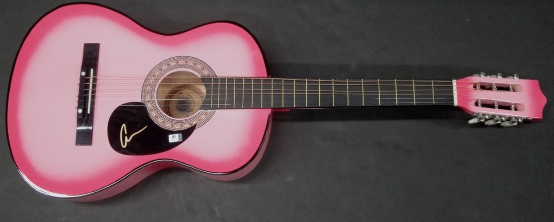 Camaron Marvel Ochs Autographed Guitar with Global Authentics Certification: Camaron Marvel Ochs Autographed Guitar with Global Authentics Certification This full-size guitar is hand-signed by Camaron Marvel Ochs, featuring an authentic signature verified by Global Authentics