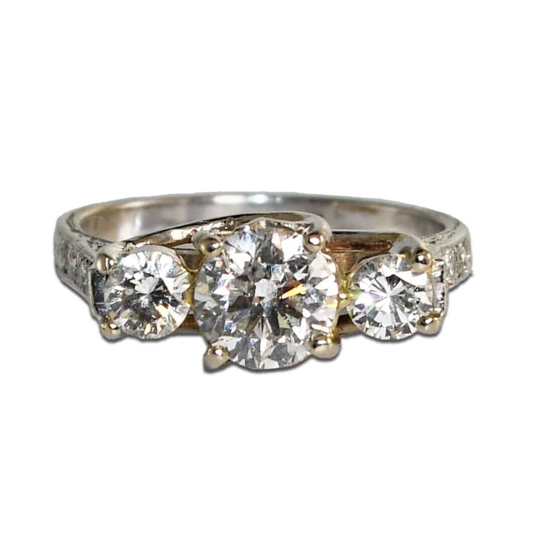 14K White Gold Three-Stone Diamond Ring 1.46ctw Ladies Jewelry: 14K White Gold Three-Stone Diamond Ring 1.46ctw Ladies Jewelry This elegant 14K white gold ladies' three-stone diamond ring features a stunning design that showcases a total diamond weight of 1.46 car