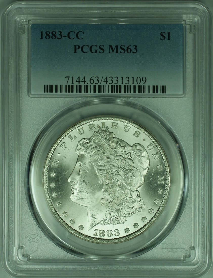 1883-CC Morgan Silver Dollar Coin PCGS MS63 Uncirculated: 1883-CC Morgan Silver Dollar Coin PCGS MS63 Uncirculated This 1883-CC Morgan Silver Dollar is an iconic piece of American numismatics, showcasing the craftsmanship of the Carson City Mint. Graded MS-6