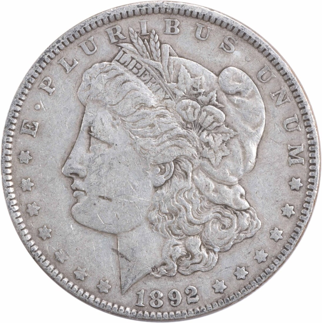 1892 Morgan Dollar Silver Coin Philadelphia XF Uncertified: 1892 Morgan Dollar Silver Coin Philadelphia XF Uncertified This 1892 Morgan Silver Dollar, a classic piece of American numismatics, is circulated and ungraded. Struck in Philadelphia, the coin feature