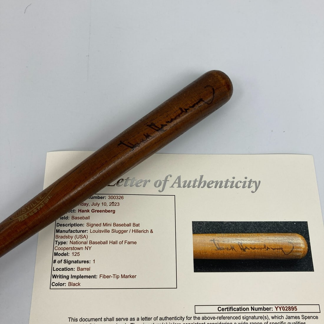Hank Greenberg Signed 1950s Mini Baseball Bat with JSA COA: Hank Greenberg Signed 1950s Mini Baseball Bat with JSA COA This is an original 1950's Hall of Fame mini baseball bat signed by legendary player Hank Greenberg. The bat showcases Greenberg's autograph,