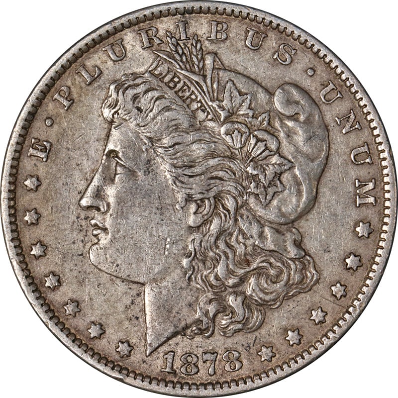 1878-P Morgan Silver Dollar 7TF Rev 79 Great for Set Builders: 1878-P Morgan Silver Dollar 7TF Rev 79 Great for Set Builders This 1878-P 7TF Rev 79 Morgan Silver Dollar is a beautifully circulated coin ideal for any set builder. Hand-selected from a large collect
