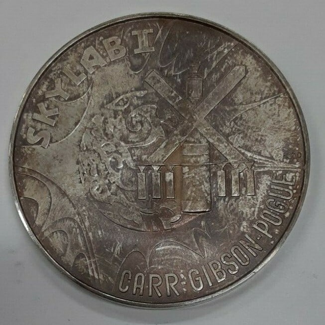 Skylab I .999 Silver Medal by Deschler & Sohn 1973-74: Skylab I .999 Silver Medal by Deschler & Sohn 1973-74 This is a .999 silver medal commemorating the Skylab I space station mission from 1973-74. The medal features a detailed design celebrating Americ