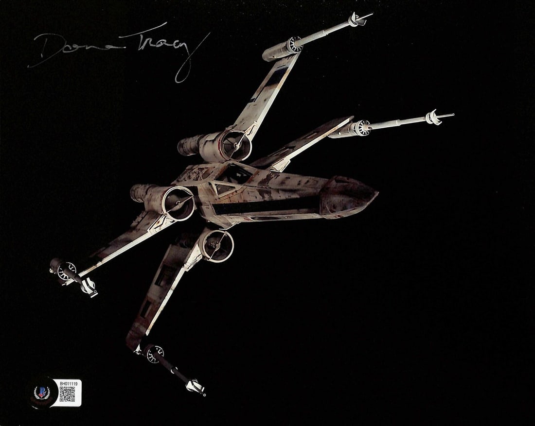 Donna Tracy Signed Star Wars X-Wing 11x14 Photograph Beckett Authenticated: Donna Tracy Signed Star Wars X-Wing 11x14 Photograph Beckett Authenticated Celebrate the legacy of Star Wars with this stunning 11x14 color photograph of an X-Wing, autographed by Donna Tracy, a key c