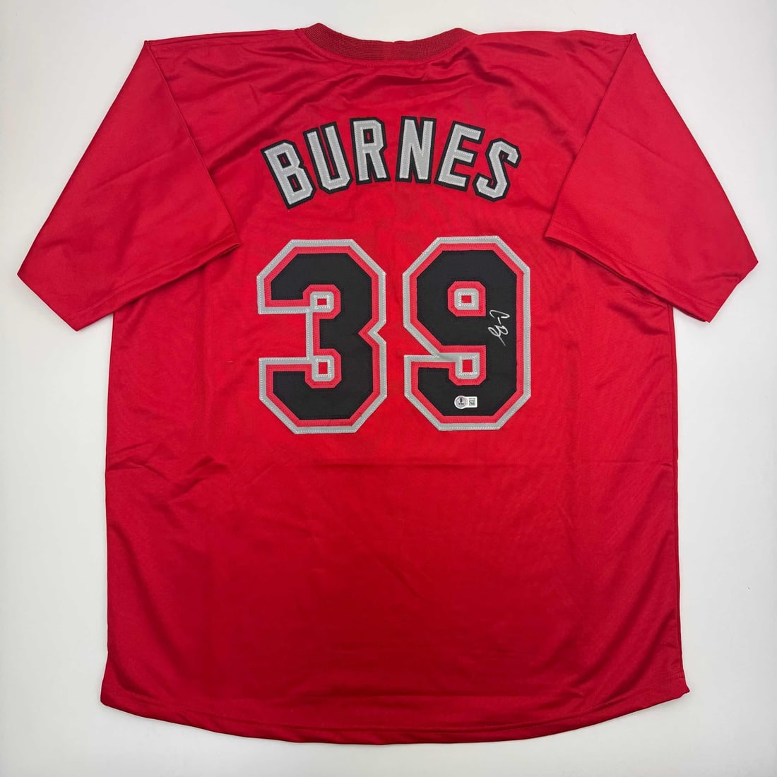 Corbin Burnes Signed Arizona Red Baseball Jersey Beckett BAS COA: Corbin Burnes Signed Arizona Red Baseball Jersey Beckett BAS COA This is an autographed Corbin Burnes Arizona Red Baseball Jersey, authenticated by Beckett Grading Services (BAS). The original jersey