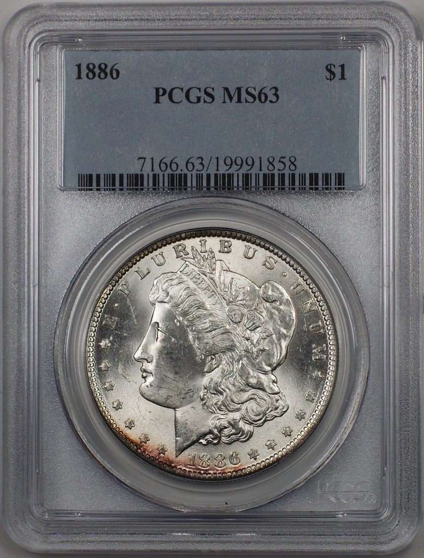 1886 Morgan Silver Dollar Coin PCGS MS-63 Uncirculated Silver: 1886 Morgan Silver Dollar Coin PCGS MS-63 Uncirculated Silver This 1886 Morgan Silver Dollar is a stunning example of American coinage, featuring a grade of MS-63 as certified by PCGS. Minted in Phila