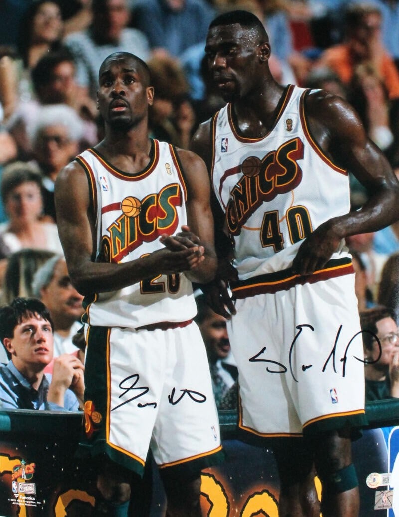 Gary Payton Shawn Kemp Signed Seattle SuperSonics 16x20 Photo Beckett Authenticated: Gary Payton Shawn Kemp Signed Seattle SuperSonics 16x20 Photo Beckett Authenticated This original 16x20 photograph features iconic basketball players Gary Payton and Shawn Kemp, both of whom have sign