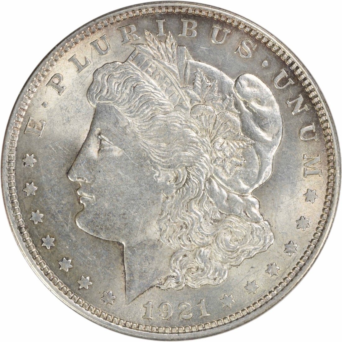 1921 Morgan Silver Dollar AU Uncertified 90% Silver Coin: 1921 Morgan Silver Dollar AU Uncertified 90% Silver Coin This 1921 Morgan Silver Dollar is a stunning example of American coinage, featuring a beautiful design by George T. Morgan. This particular coi
