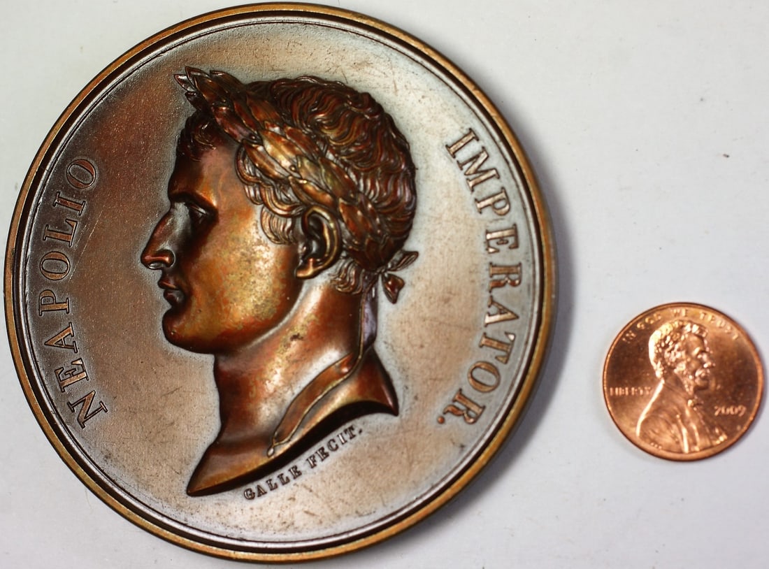 Napoleon High Relief Bronze Medal Uncirculated Exonumia: Napoleon High Relief Bronze Medal Uncirculated Exonumia This striking bronze medal features a high relief design of Napoleon Bonaparte, highlighting his imperial stature. The medal is made from bronze