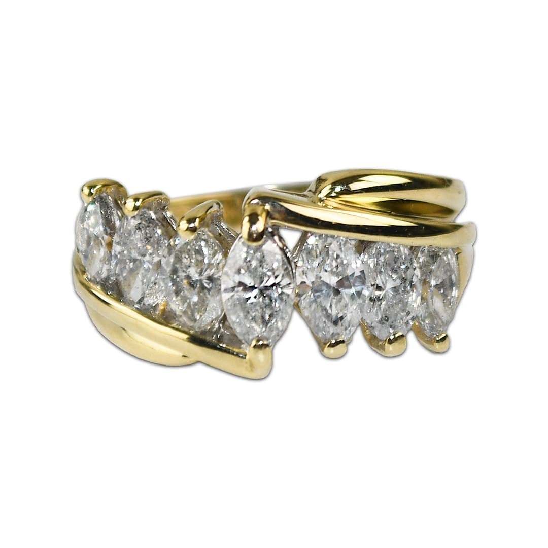 14K Yellow Gold 1.50ct Marquise Diamond Cocktail Ring: 14K Yellow Gold 1.50ct Marquise Diamond Cocktail Ring This stunning cocktail ring features seven exquisite marquise diamonds totaling 1.50 carats, set in luxurious 14K yellow gold. The diamonds exhibi