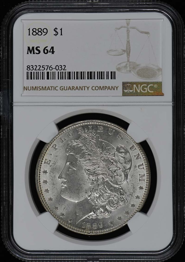 1889 Morgan Dollar NGC MS64 Certified Philadelphia Coin: 1889 Morgan Dollar NGC MS64 Certified Philadelphia Coin This 1889 Morgan Dollar is a remarkable piece of numismatic history, graded MS64 by NGC, ensuring its high quality and uncirculated condition. M