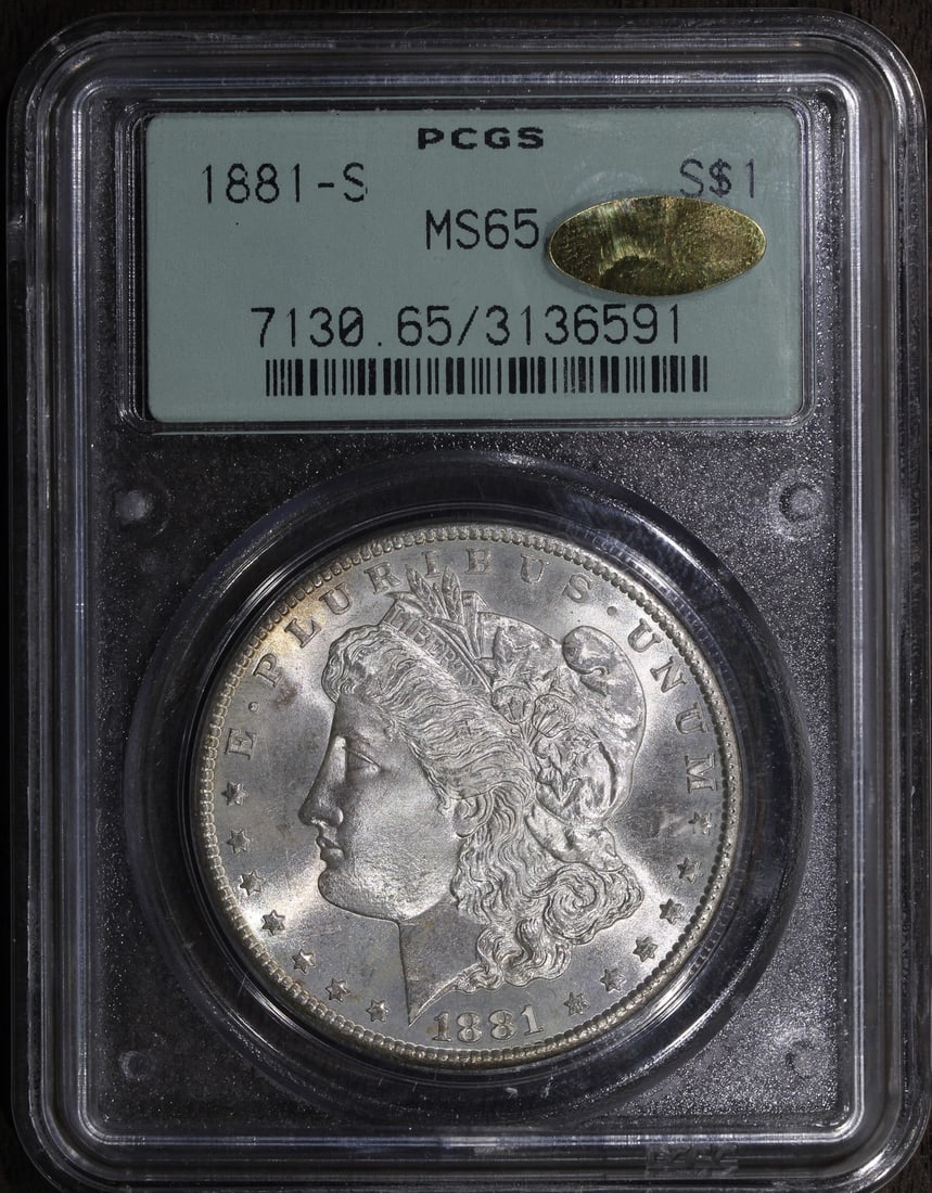 1881-S Morgan Silver Dollar MS65 Gold CAC PCGS OGH: 1881-S Morgan Silver Dollar MS65 Gold CAC PCGS OGH This 1881-S Morgan Silver Dollar is an exquisite example of numismatic craftsmanship. Graded MS 65 by PCGS and featuring a CAC certification, this co