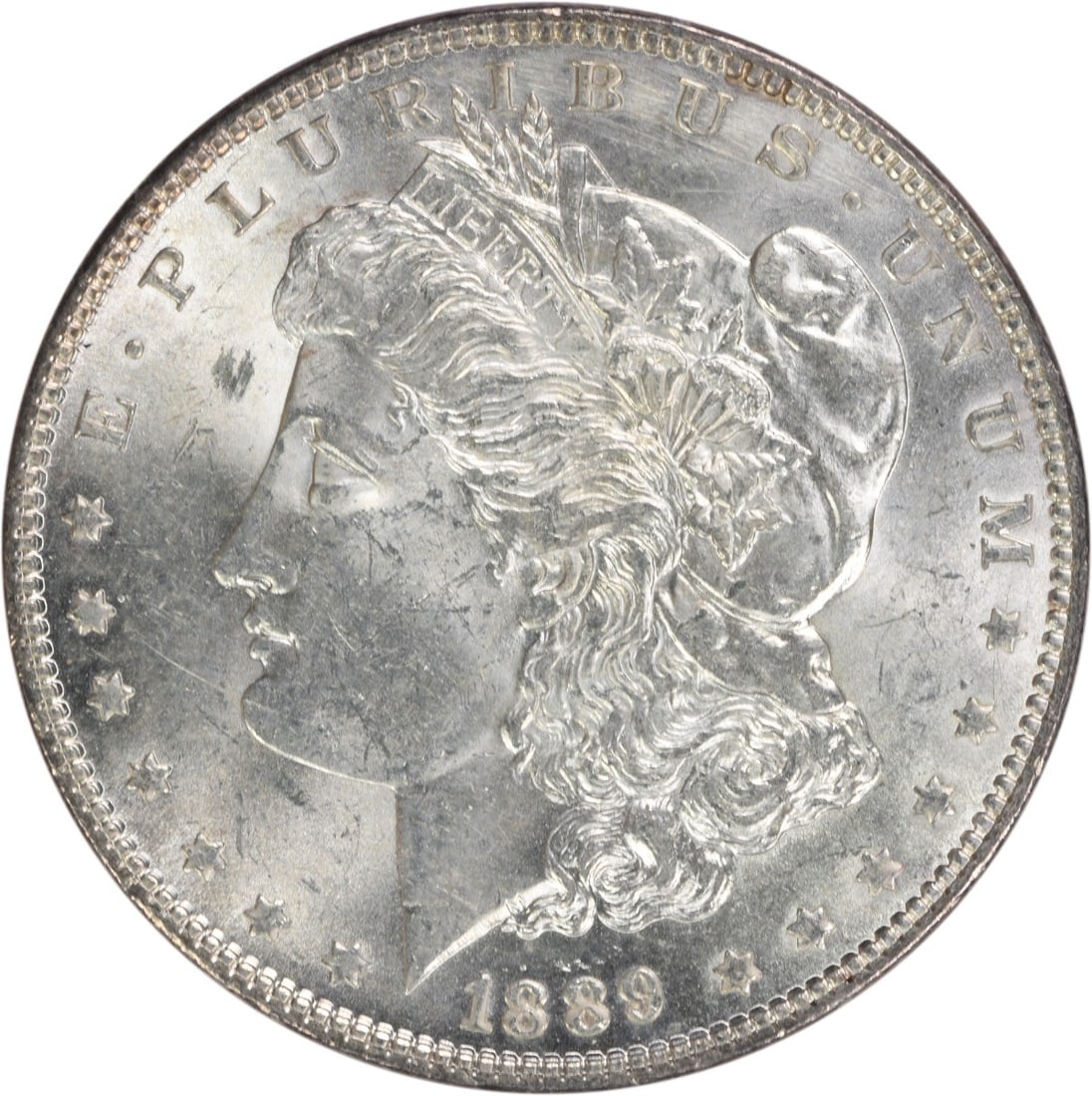 1889 Morgan Silver Dollar Choice BU Uncertified Silver Coin: 1889 Morgan Silver Dollar Choice BU Uncertified Silver Coin This 1889 Morgan Silver Dollar is an exquisite choice for collectors, featuring a stunning uncirculated grade of Choice BU. Crafted from hig