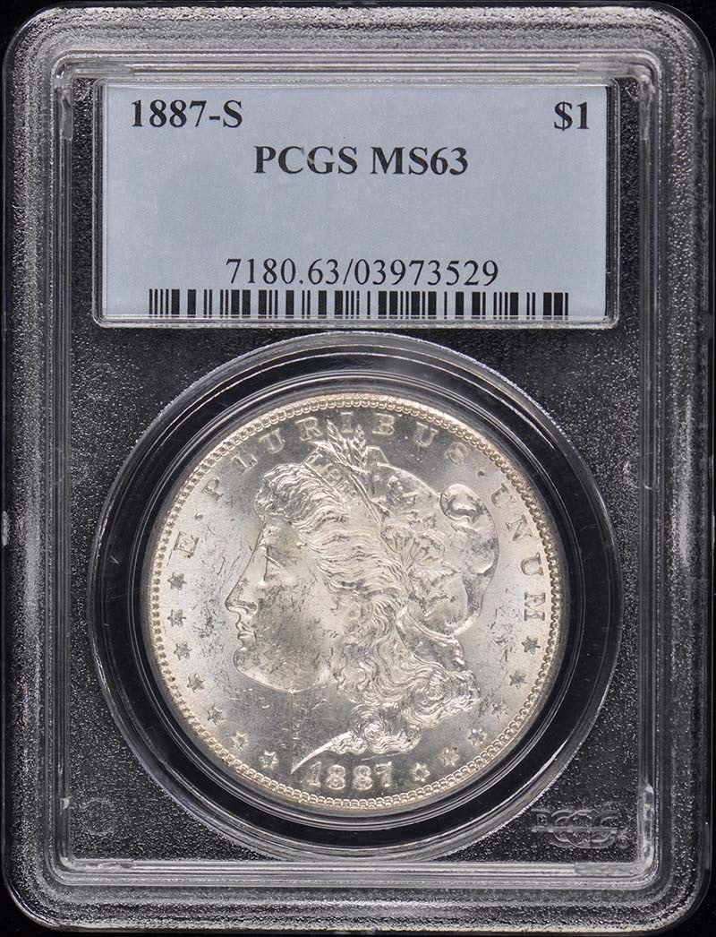 1887-S Morgan Dollar PCGS MS63 San Francisco Uncirculated Coin: 1887-S Morgan Dollar PCGS MS63 San Francisco Uncirculated Coin This 1887-S Morgan Dollar is a stunning example of U.S. coinage, expertly graded by PCGS with a designation of MS63, indicating its uncir