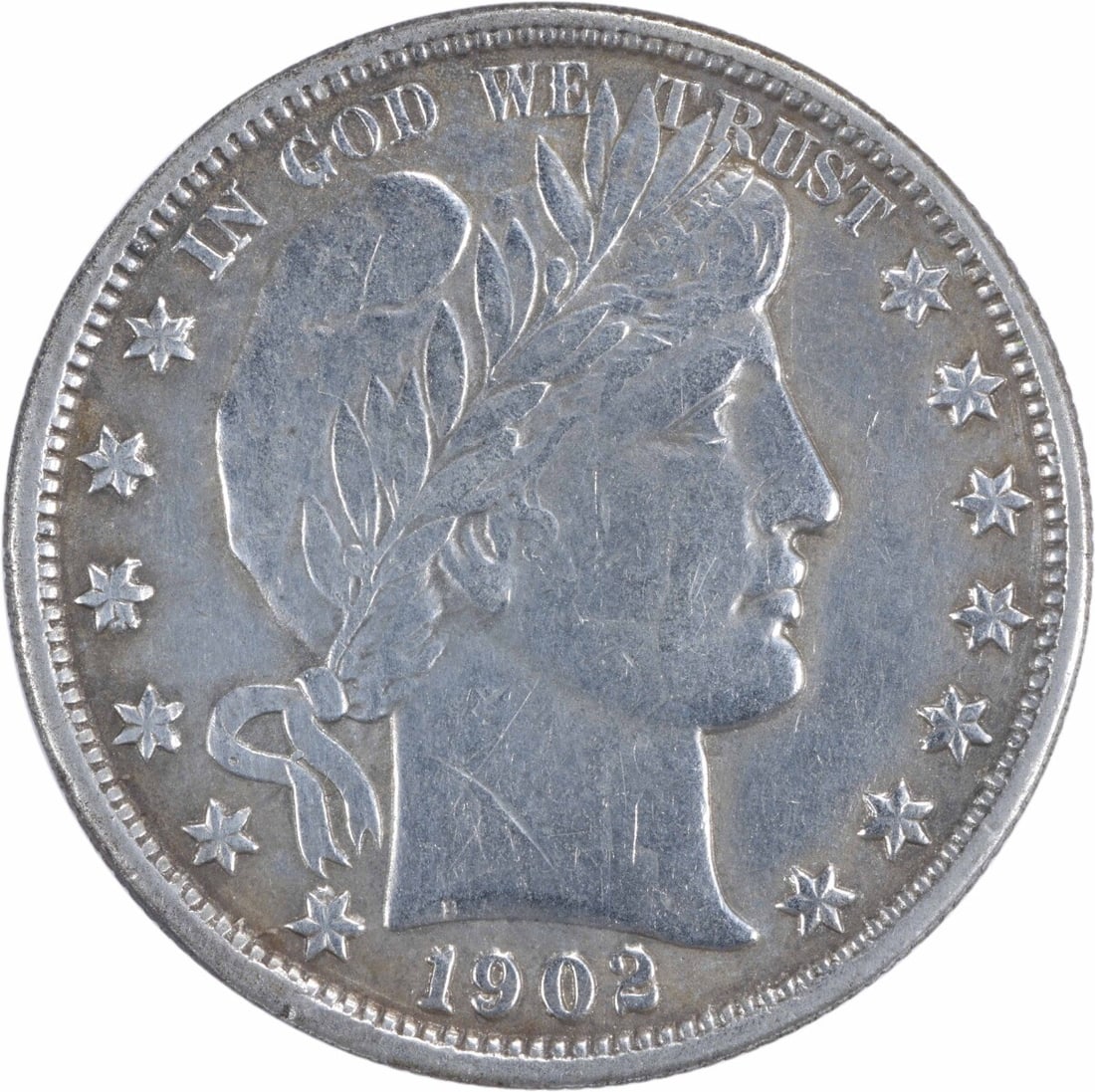 1902 Barber Silver Half Dollar 50C Uncertified XF Philadelphia Mint: 1902 Barber Silver Half Dollar 50C Uncertified XF Philadelphia Mint This 1902 Barber Silver Half Dollar is a remarkable collectible that showcases the artistry of designer Charles E. Barber. Struck in