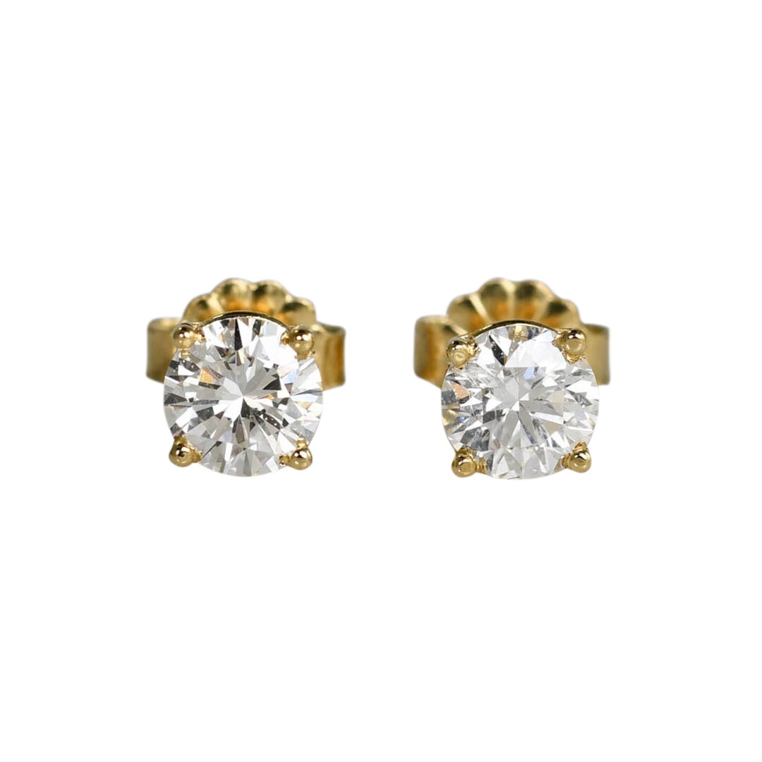 GIA Certified 14K Yellow Gold 1.01ct Diamond Stud Earrings: GIA Certified 14K Yellow Gold 1.01ct Diamond Stud Earrings Elegant diamond stud earrings crafted in 14K yellow gold featuring two stunning round brilliant cut diamonds. The total carat weight is 1.01