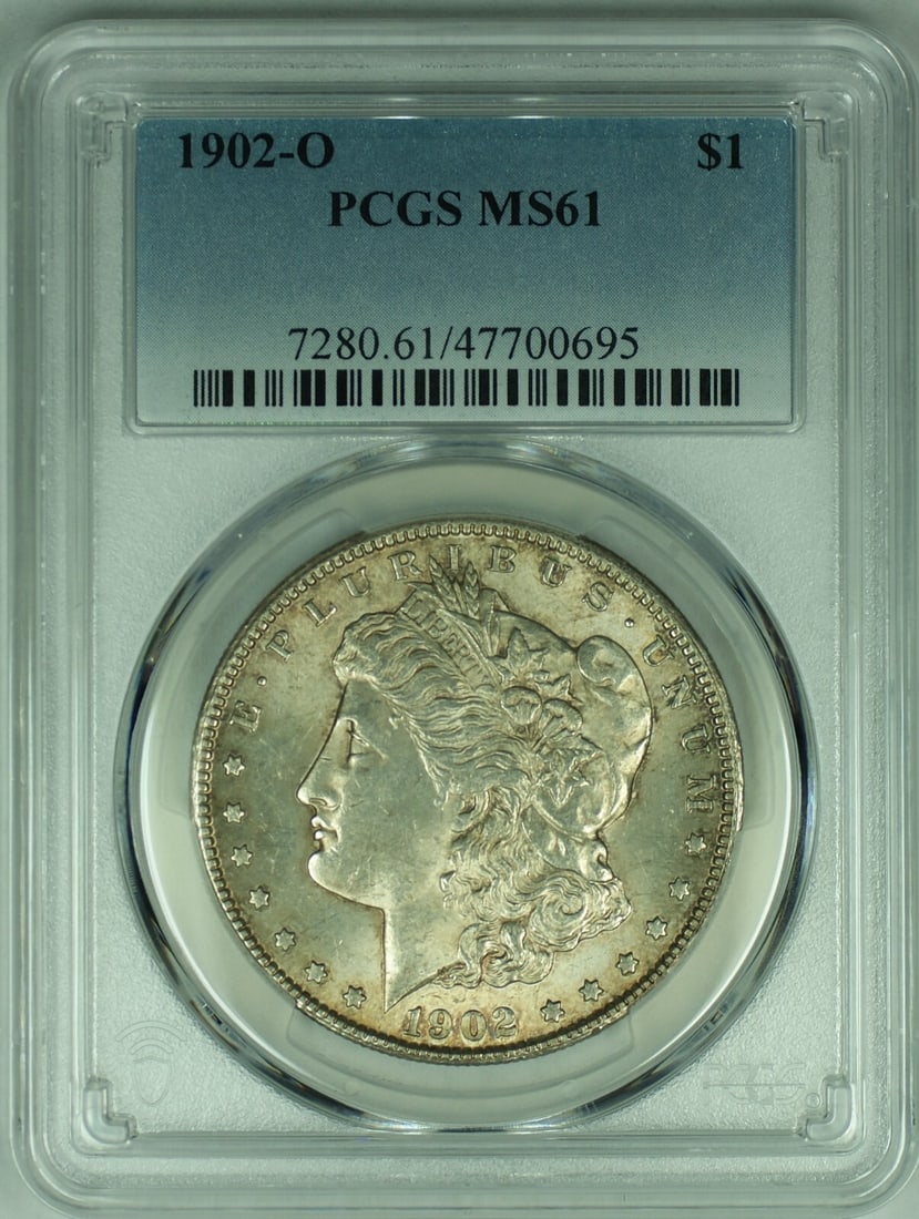 1902-O Morgan Silver Dollar PCGS MS 61+ Uncirculated Toned Coin: 1902-O Morgan Silver Dollar PCGS MS 61+ Uncirculated Toned Coin This 1902-O Morgan Silver Dollar is a stunning example of American numismatic history. Graded MS 61+ by PCGS, this uncirculated coin fea