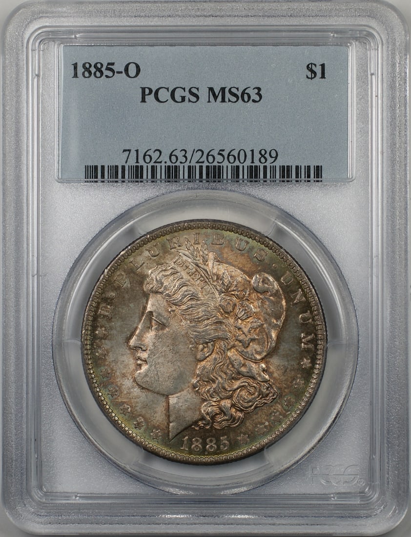 1885-O Morgan Silver Dollar PCGS MS 63 Toned Coin: 1885-O Morgan Silver Dollar PCGS MS 63 Toned Coin This 1885-O Morgan Silver Dollar is a remarkable piece certified by PCGS with a grade of MS 63. Minted in New Orleans, this uncirculated coin showcase