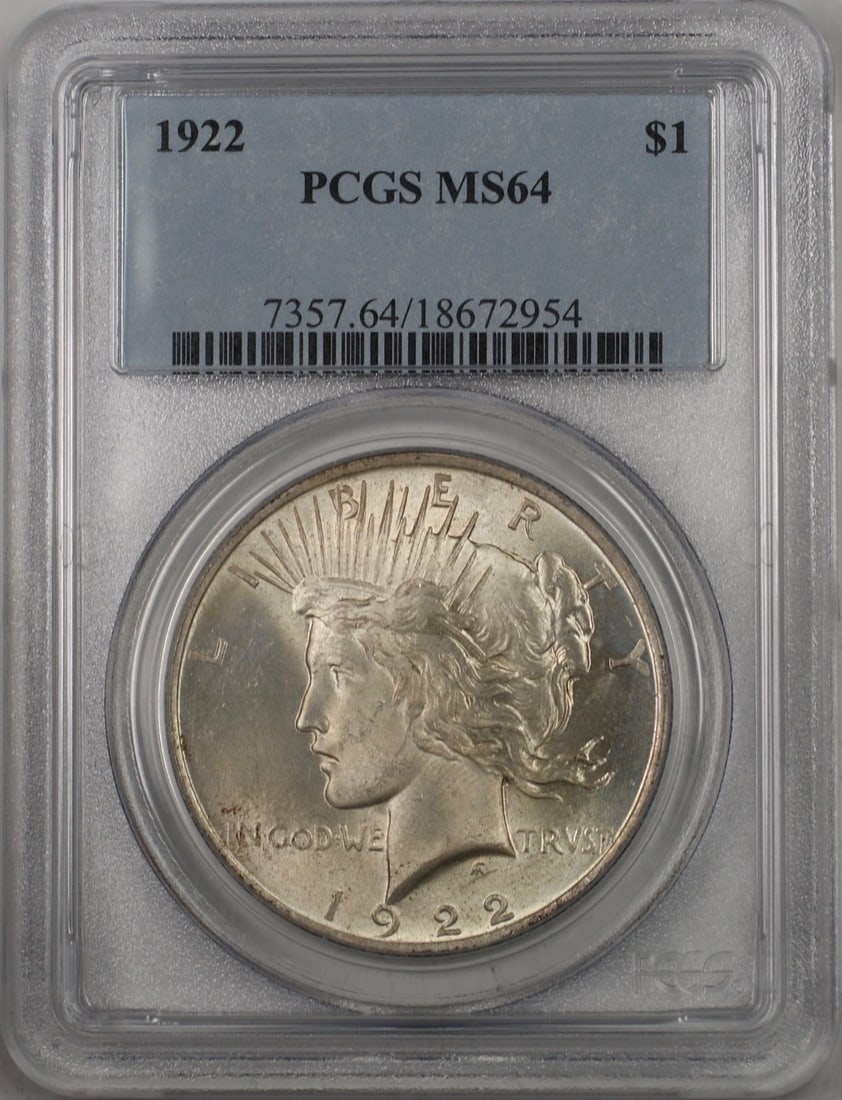 1922 Silver Peace Dollar Coin PCGS MS 64 Uncirculated Lightly Toned: 1922 Silver Peace Dollar Coin PCGS MS 64 Uncirculated Lightly Toned This 1922 Silver Peace Dollar is a stunning example of American coinage, certified by PCGS with a grade of MS 64. This uncirculated
