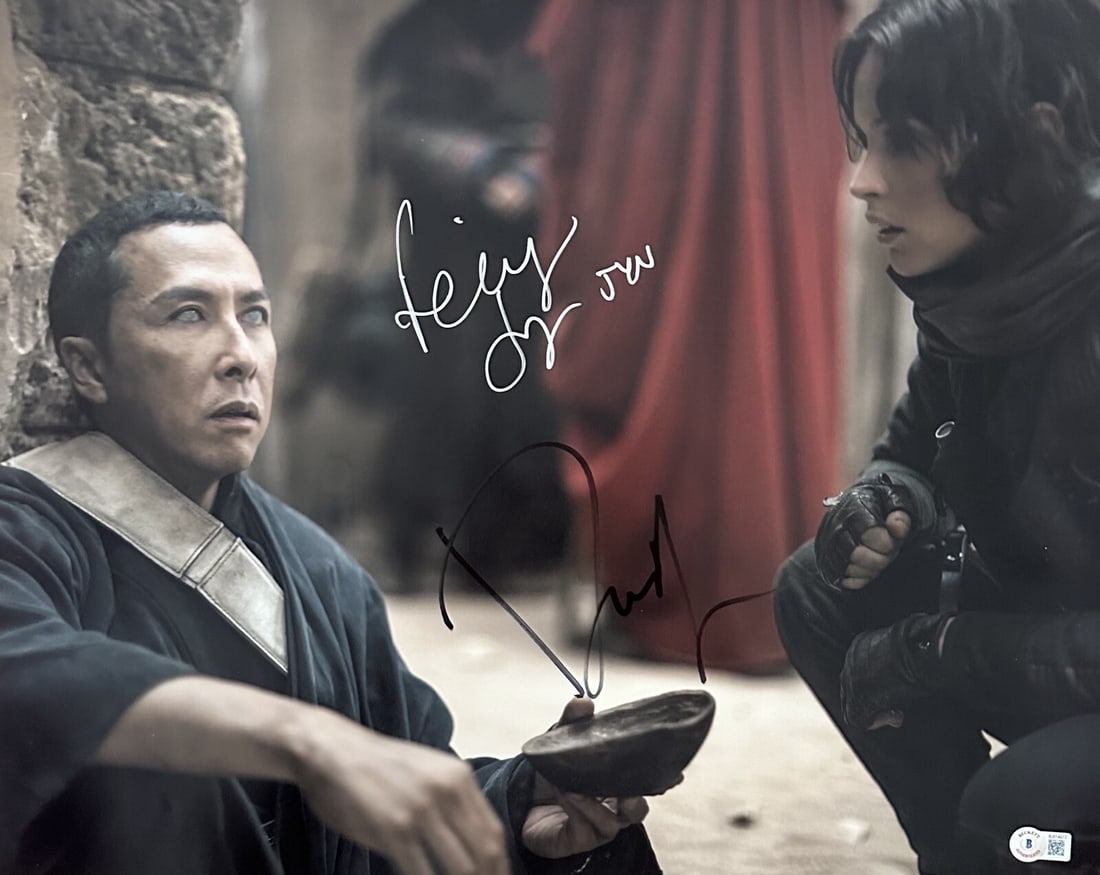 Felicity Jones Donnie Yen Signed 16x20 Photo Beckett Authenticated: Felicity Jones Donnie Yen Signed 16x20 Photo Beckett Authenticated This stunning 16x20 photograph features the autographs of Felicity Jones and Donnie Yen, two stars of the acclaimed film 'Rogue One'.