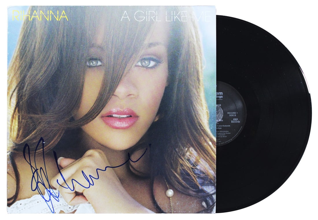Rihanna Signed A Girl Like Me Album Cover Vinyl Gem Mint 10 Beckett COA: Rihanna Signed A Girl Like Me Album Cover Vinyl Gem Mint 10 Beckett COA This stunning autographed album cover of "A Girl Like Me" features the signature of the iconic artist Rihanna. Graded Gem Mint 1