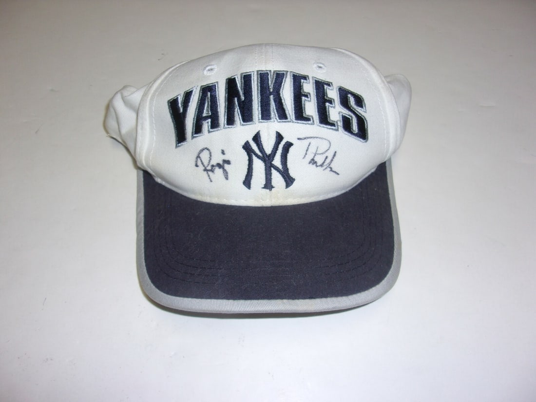 Regis Philbin Signed New York Yankees Hat with COA: Regis Philbin Signed New York Yankees Hat with COA This authentic New York Yankees hat is signed by television celebrity Regis Philbin, adding a unique element to this collectible piece. The hat is pr