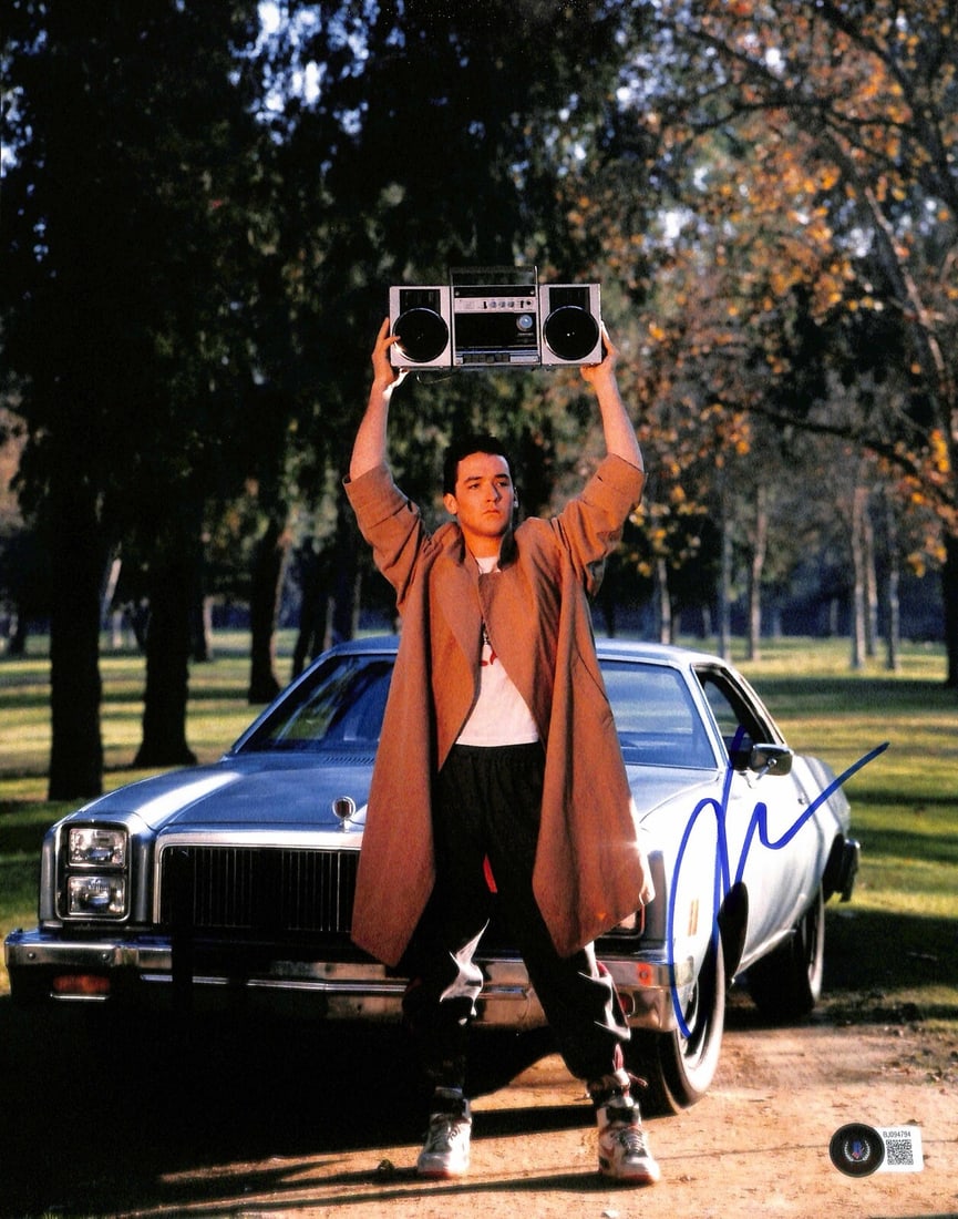 John Cusack Signed 11x14 Say Anything Photo Beckett Authenticated: John Cusack Signed 11x14 Say Anything Photo Beckett Authenticated This is an autographed 11x14 photograph of actor John Cusack, who famously portrayed Lloyd Dobler in the classic film Say Anything. Th