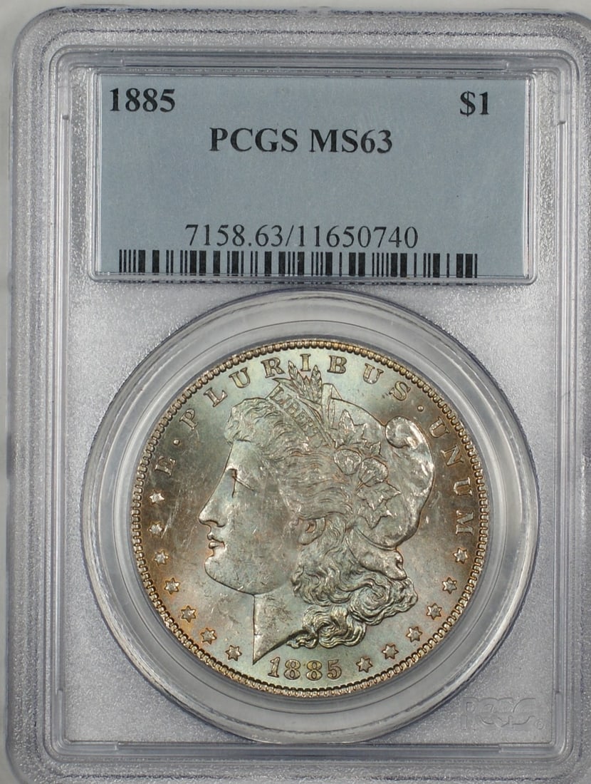 1885 Morgan Silver Dollar Coin PCGS MS63 Beautifully Toned: 1885 Morgan Silver Dollar Coin PCGS MS63 Beautifully Toned This 1885 Morgan Silver Dollar is a stunning coin featuring beautifully toned obverse details. Certified by PCGS with a grade of MS 63, this