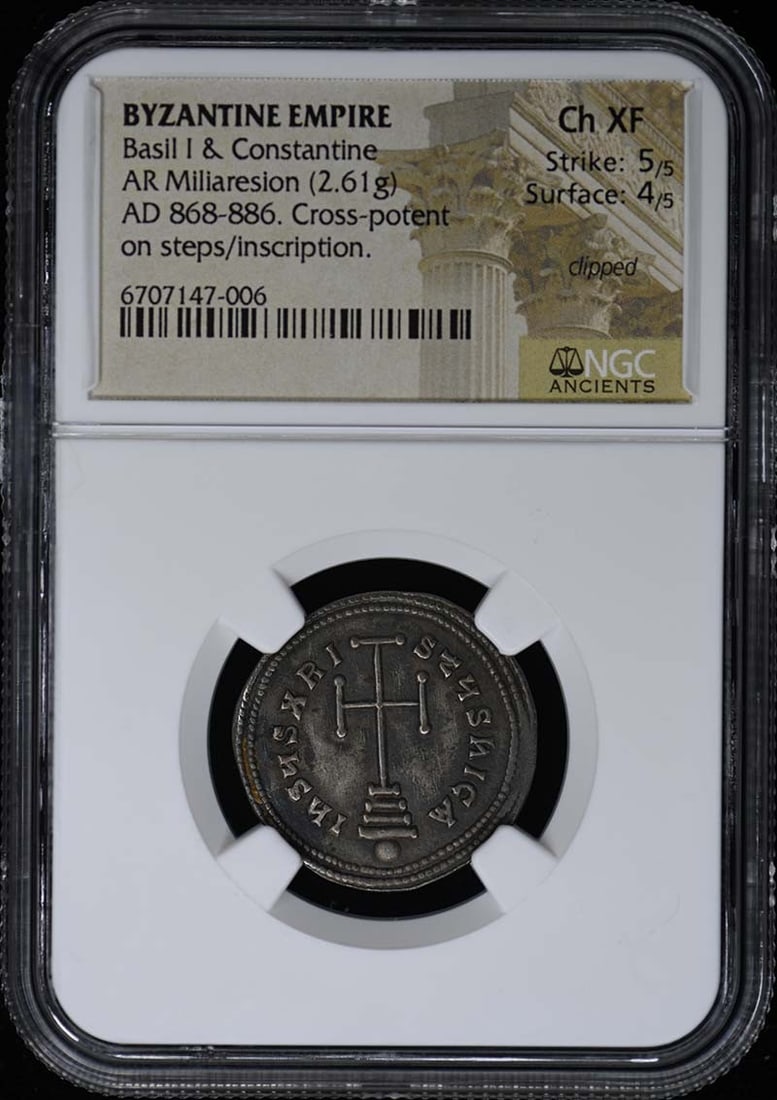 Byzantine Miliaresion Coin 868-886 AD Basil I Constantine NGC Ch XF: Byzantine Miliaresion Coin 868-886 AD Basil I Constantine NGC Ch XF This Byzantine Miliaresion, minted during the reign of Basil I and Constantine from 868-886 AD, is a noteworthy piece for collectors