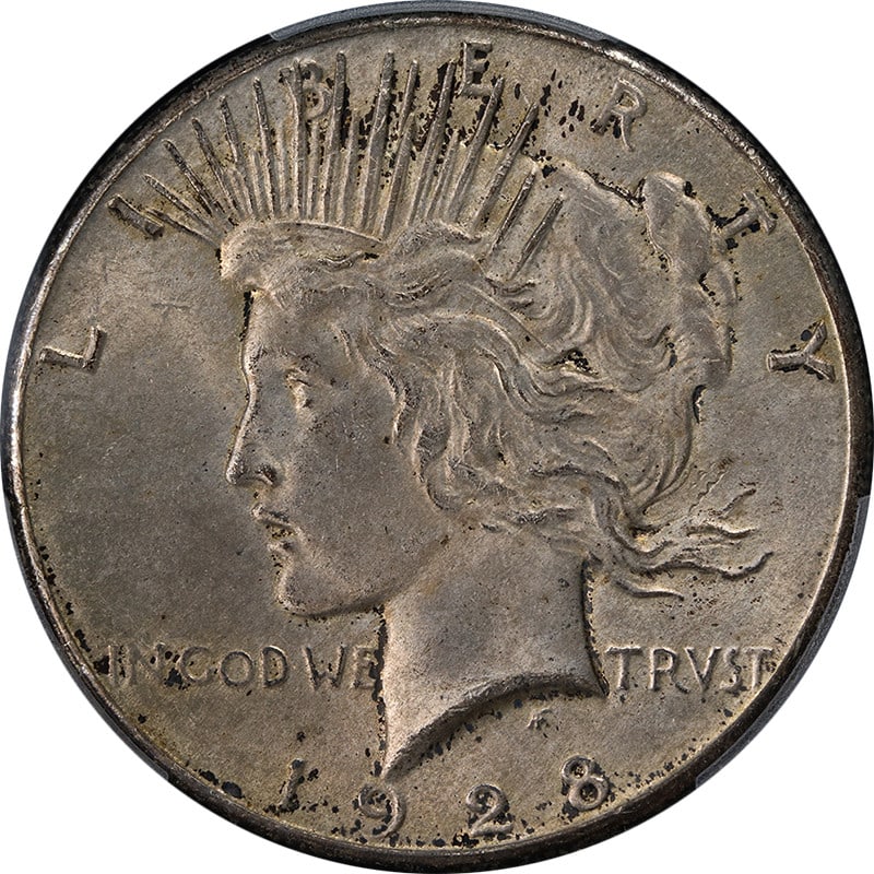 1928-P Peace Dollar PCGS MS63 Uncirculated Silver Coin: 1928-P Peace Dollar PCGS MS63 Uncirculated Silver Coin This 1928-P Peace Dollar is a remarkable piece of numismatic history, certified by PCGS with a grade of MS63. This coin features a beautiful stri