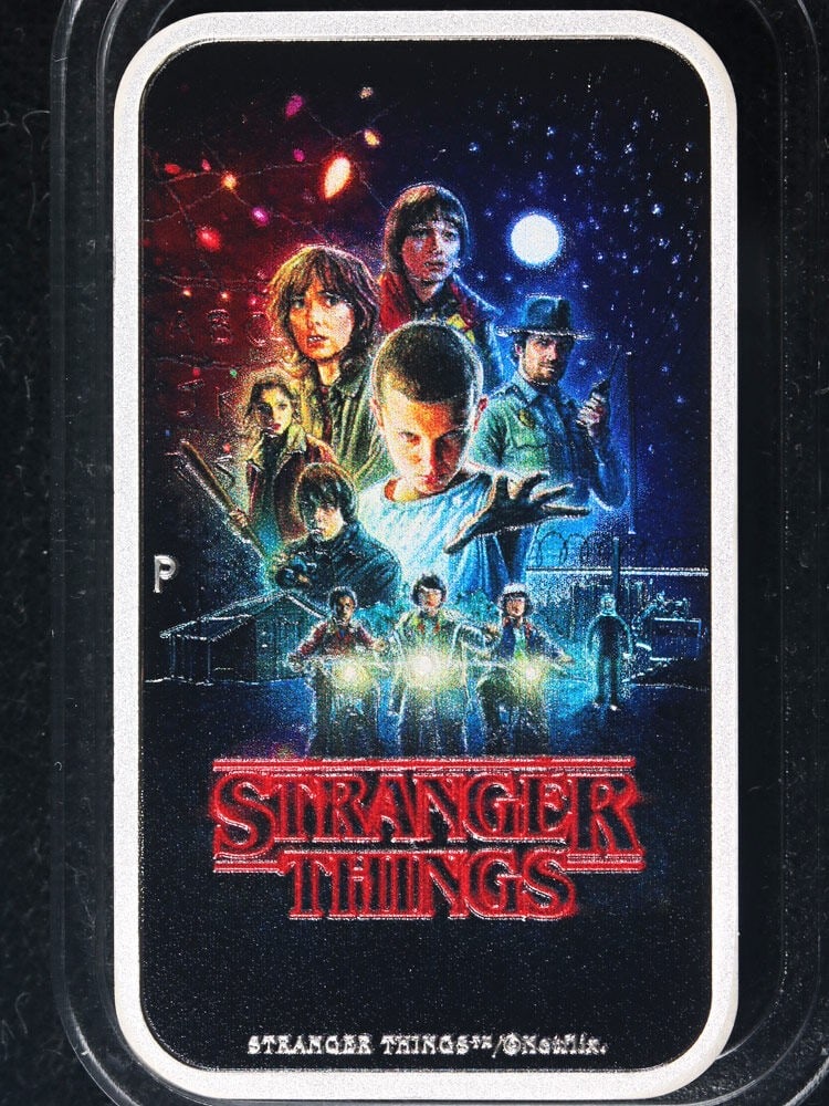 2026 Tuvalu 1 oz Silver Stranger Things Season One Color Poster Bar: 2026 Tuvalu 1 oz Silver Stranger Things Season One Color Poster Bar This is a 2026 Tuvalu 1 ounce silver coin featuring a colorized poster design from Stranger Things Season 1. Composed of 0.999 fine