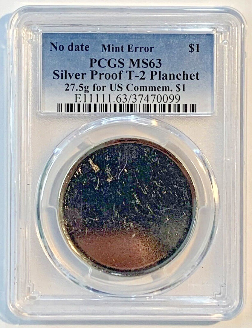 Mint Error Silver Proof T-2 Planchet U.S. Commemorative $1 Coin PCGS MS 63: Mint Error Silver Proof T-2 Planchet U.S. Commemorative $1 Coin PCGS MS 63 This unique Mint Error Silver Proof T-2 Planchet is an exceptional piece for collectors of U.S. commemorative coins. Struck f