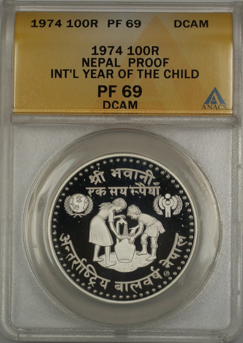 1974 Nepal 100 Rupees Silver Coin ANACS PF 69 DCAM Collectible: 1974 Nepal 100 Rupees Silver Coin ANACS PF 69 DCAM Collectible Celebrate the 1974 Year of the Child with this exquisite Proof Nepal 100 Rupees Silver Coin. This stunning coin, certified by ANACS with