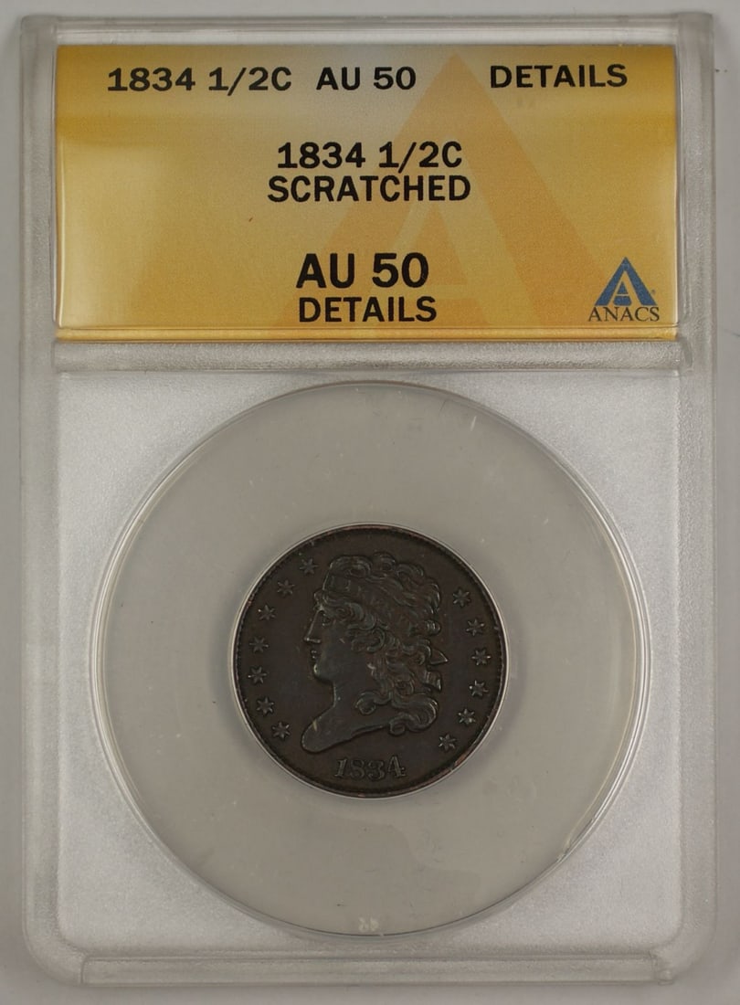1834 Classic Head Half Cent Coin ANACS AU 50 Certified Copper: 1834 Classic Head Half Cent Coin ANACS AU 50 Certified Copper This 1834 Classic Head Half Cent Coin features a detailed design, certified by ANACS with a grade of AU-50. Minted in Philadelphia, this c
