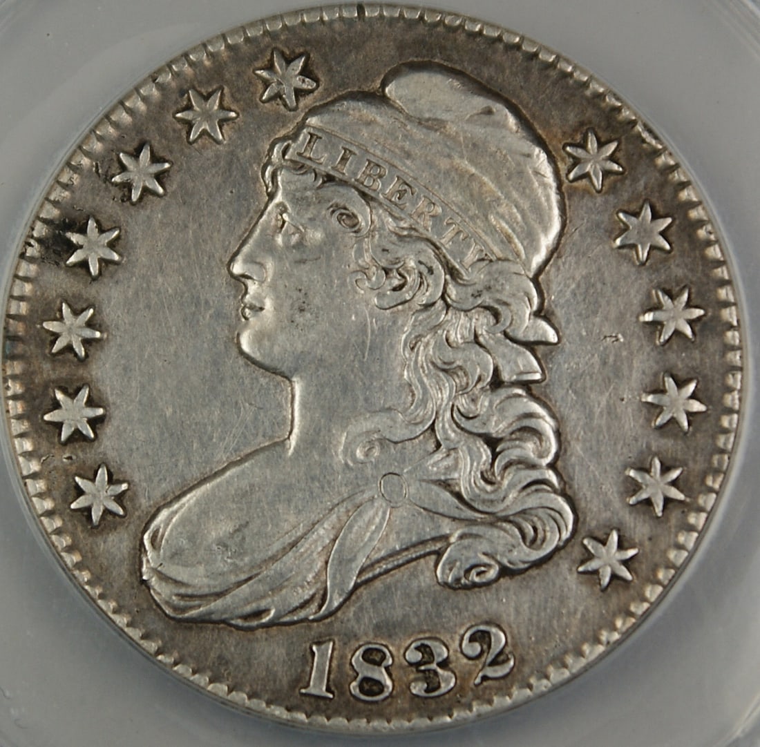 1832 Capped Bust Silver Half Dollar ANACS AU-50 Circulated Coin: 1832 Capped Bust Silver Half Dollar ANACS AU-50 Circulated Coin This 1832 Capped Bust Silver Half Dollar is a remarkable piece of numismatic history. Certified by ANACS with a grade of AU-50, this coi